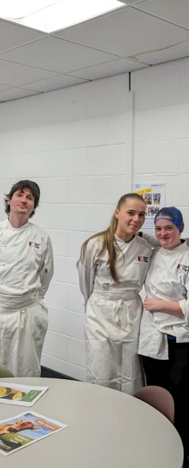 Group of students at Easterhouse food stall  Group of students at Easterhouse food stall